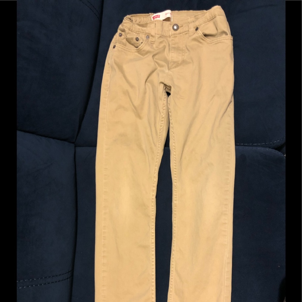 Levi’s beige thin jeans, size 12, gently used, has the strap tighteners